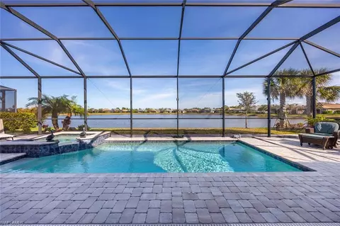 7675 Winding Cypress Dr, Naples, FL 34114 photo 2