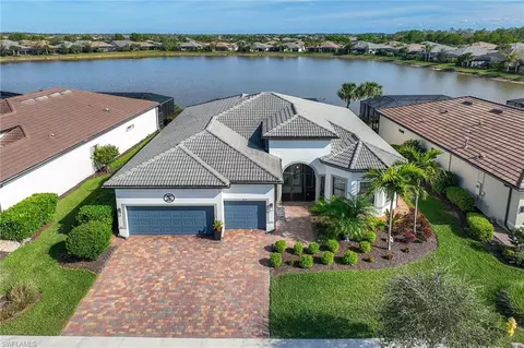 7675 Winding Cypress Dr, Naples, FL 34114 photo 3