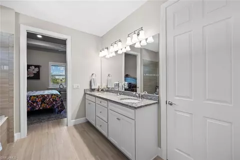 7675 Winding Cypress Dr, Naples, FL 34114 photo 19