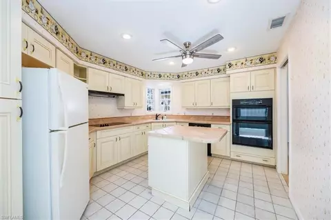 Kitchen - 57 Grey Wing Pt, Naples, FL 34113 photo 2 of 2