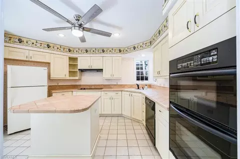 Kitchen - 57 Grey Wing Pt, Naples, FL 34113 photo 1 of 2
