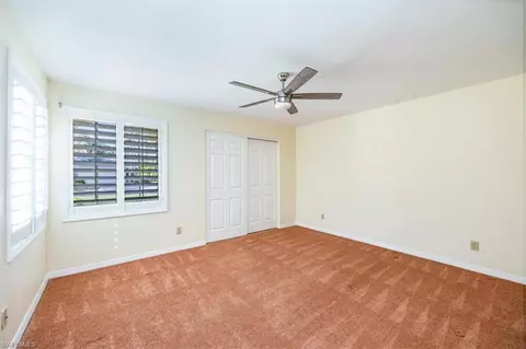 Bedroom - 57 Grey Wing Pt, Naples, FL 34113 photo 2 of 2