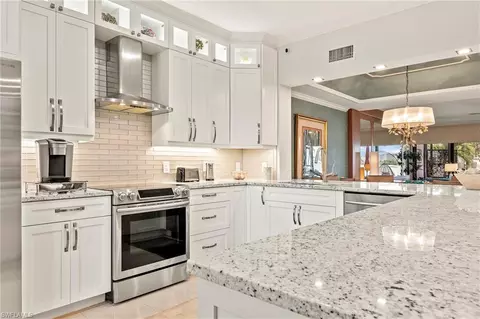 108 La Peninsula Blvd #108, Naples, FL 34113 photo 9
