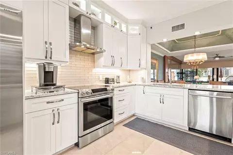108 La Peninsula Blvd #108, Naples, FL 34113 photo 12