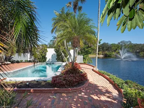 Exterior - 656 Bridgeway Ln, Naples, FL 34108 photo 6 of 11