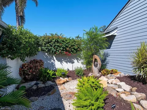Exterior - 656 Bridgeway Ln, Naples, FL 34108 photo 4 of 11