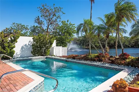 Exterior - 656 Bridgeway Ln, Naples, FL 34108 photo 5 of 11