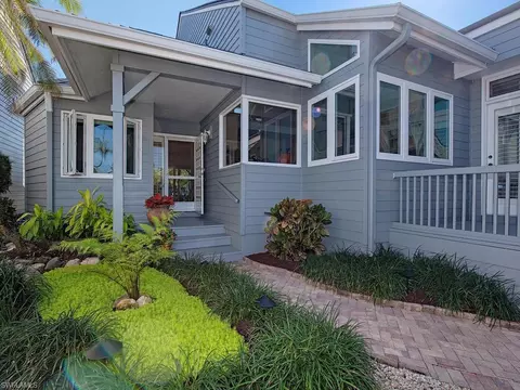 Exterior - 656 Bridgeway Ln, Naples, FL 34108 photo 2 of 11