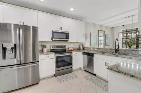 15586 Summit Place Cir #404, Naples, FL 34119