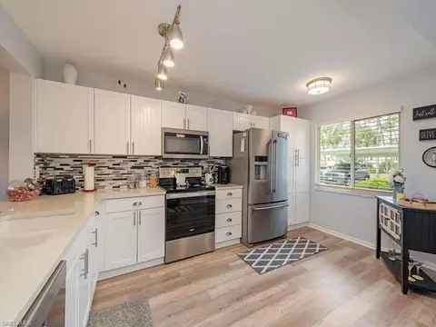 Kitchen - 780 Augusta Blvd #C101, Naples, FL 34113 photo 2 of 2