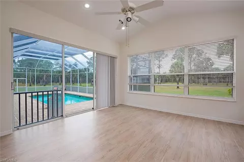 Living - 775 3rd St NW, Naples, FL 34120 photo 2 of 2