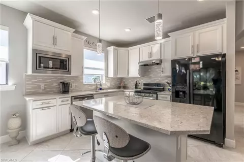 7686 Jacaranda Ln, Naples, FL 34114