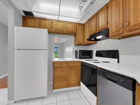 Kitchen - 37 High Point Cir E #106, Naples, FL 34103 photo 1 of 2