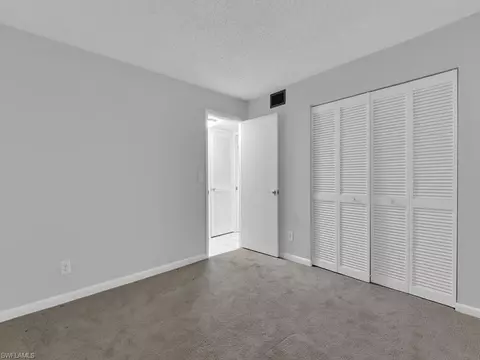 Bedroom - 37 High Point Cir E #106, Naples, FL 34103 photo 1 of 4
