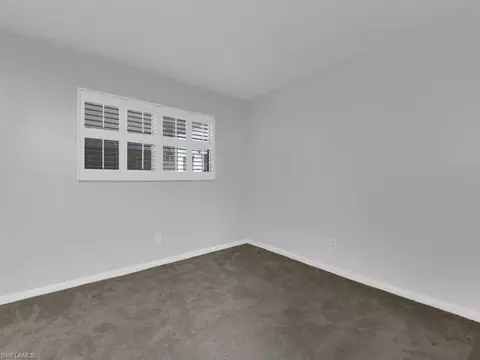 Bedroom - 37 High Point Cir E #106, Naples, FL 34103 photo 2 of 4