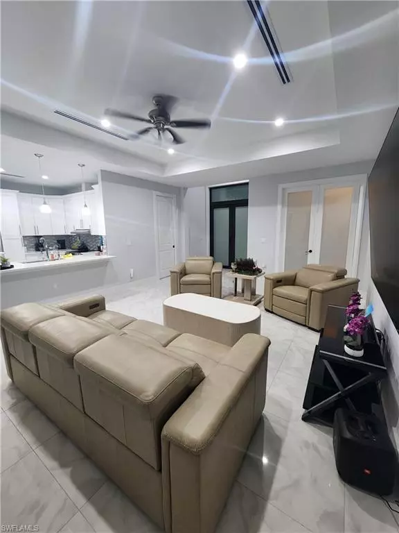 Living - 2406 37th Ave NE, Naples, FL 34120 photo 2 of 2