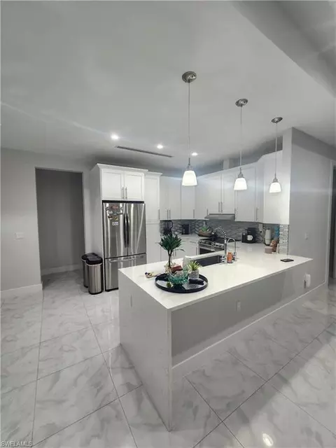 Kitchen - 2406 37th Ave NE, Naples, FL 34120 photo 1 of 2