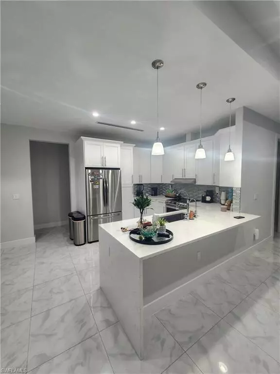 Kitchen - 2406 37th Ave NE, Naples, FL 34120 photo 1 of 2