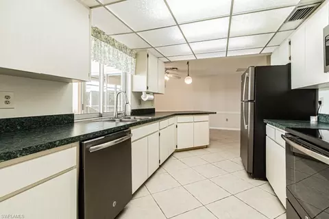 Kitchen - 5625 Cedar Tree Ln, Naples, FL 34116 photo 1 of 3