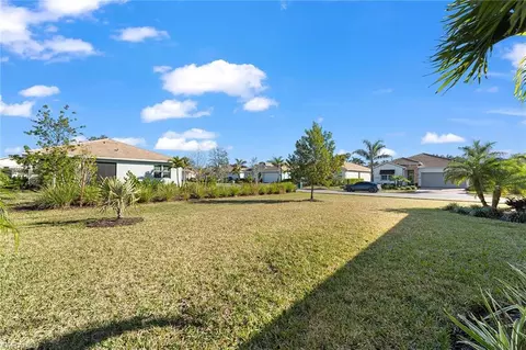 Exterior - 345 Deauville Loop, Naples, FL 34114 photo 4 of 11