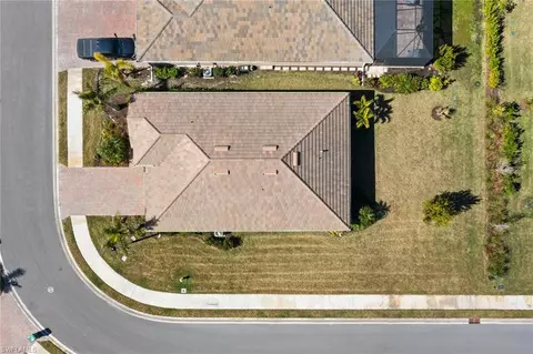 Exterior - 345 Deauville Loop, Naples, FL 34114 photo 10 of 11