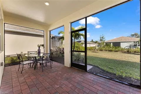 Exterior - 345 Deauville Loop, Naples, FL 34114 photo 2 of 11