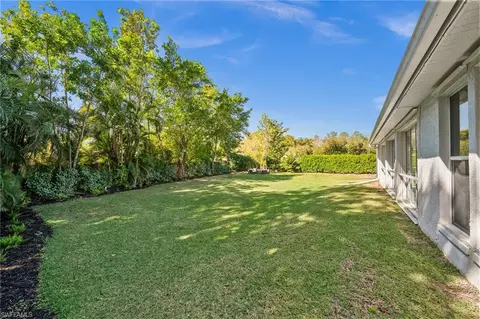 Exterior - 6857 Mill Run Cir, Naples, FL 34109 photo 7 of 10