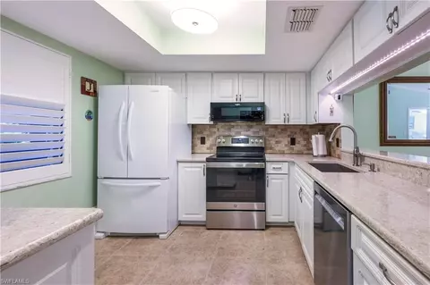 Kitchen - 2012 Pine Isle Ln #2012, Naples, FL 34112 photo 2 of 2
