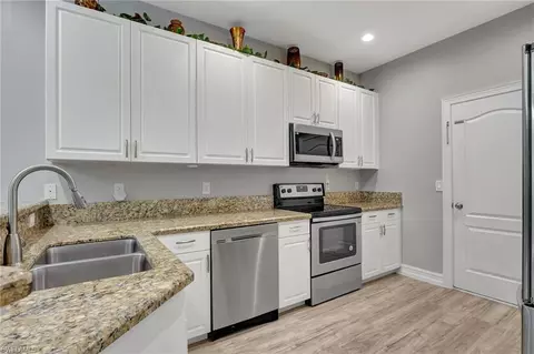 Kitchen - 10231 Tin Maple Dr #76, Estero, FL 33928 photo 2 of 3