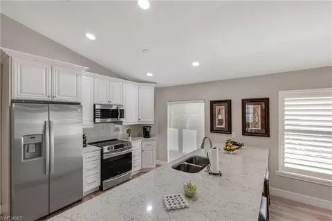 14896 Sterling Oaks Dr, Naples, FL 34110