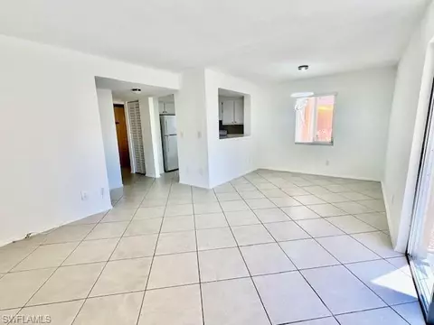 Living - 1075 Foxfire Ln #101, Naples, FL 34104 photo 2 of 2
