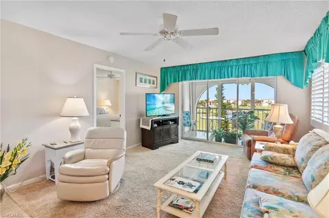 Living - 29 High Point Cir E #508, Naples, FL 34103 photo 1 of 3