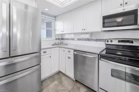 Kitchen - 37 High Point Cir E #607, Naples, FL 34103 photo 2 of 4