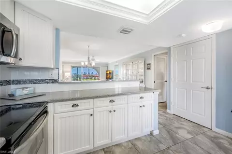 Kitchen - 37 High Point Cir E #607, Naples, FL 34103 photo 3 of 4