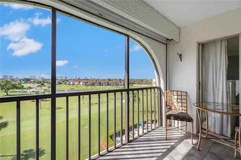 Exterior - 37 High Point Cir E #607, Naples, FL 34103 photo 2 of 10