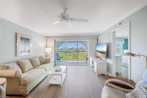 Living - 37 High Point Cir E #607, Naples, FL 34103 photo 1 of 4