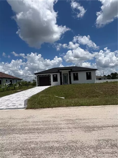 1215 Ecarte St E, Lehigh Acres, FL 33974