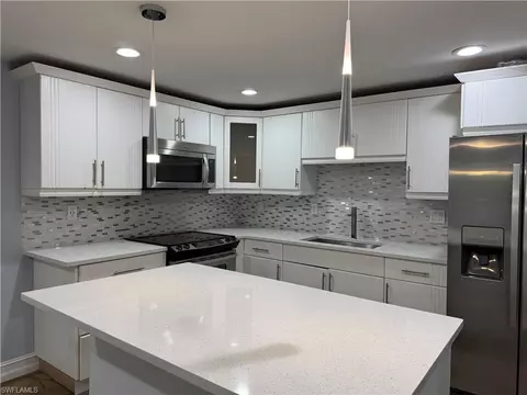 Kitchen - 5344 Treetops Dr #E-2, Naples, FL 34113 photo 2 of 4