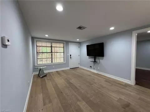 Living - 5344 Treetops Dr #E-2, Naples, FL 34113 photo 2 of 2