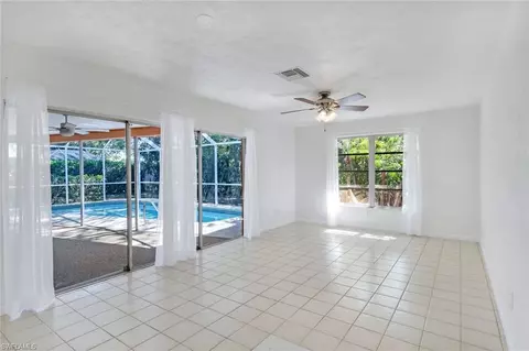 Living - 268 Baltusrol Dr, Naples, FL 34113 photo 8 of 8