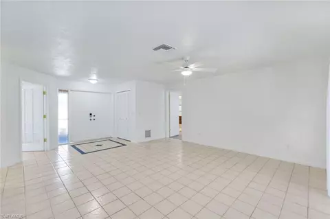 Living - 268 Baltusrol Dr, Naples, FL 34113 photo 3 of 8