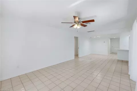Living - 268 Baltusrol Dr, Naples, FL 34113 photo 7 of 8