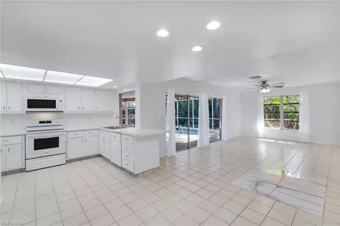 Living - 268 Baltusrol Dr, Naples, FL 34113 photo 5 of 8