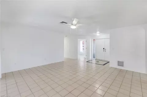 Living - 268 Baltusrol Dr, Naples, FL 34113 photo 1 of 8