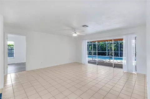 Living - 268 Baltusrol Dr, Naples, FL 34113 photo 4 of 8