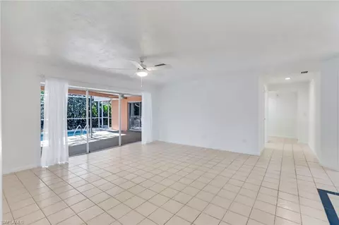 Living - 268 Baltusrol Dr, Naples, FL 34113 photo 2 of 8