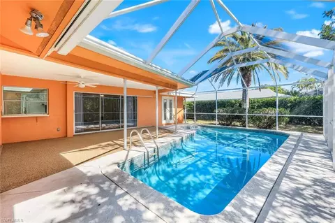 Exterior - 268 Baltusrol Dr, Naples, FL 34113 photo 6 of 8