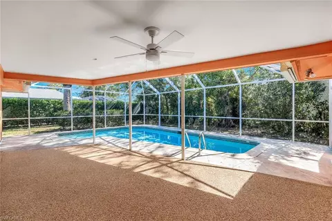 Exterior - 268 Baltusrol Dr, Naples, FL 34113 photo 4 of 8