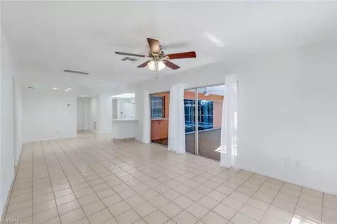 Living - 268 Baltusrol Dr, Naples, FL 34113 photo 6 of 8