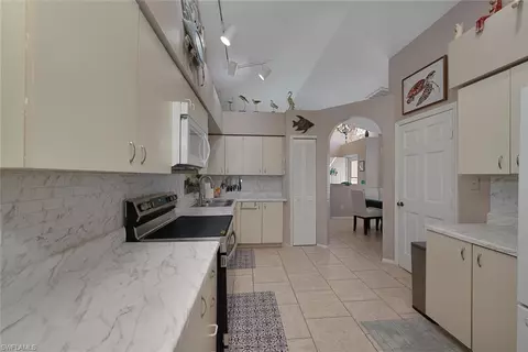 Kitchen - 20720 Andiron Pl, Estero, FL 33928 photo 1 of 2